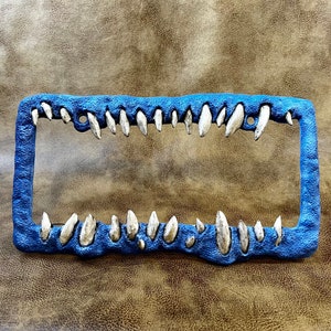 Creature teeth license plate frame anime horror Blue