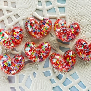 7 Pcs Clear Hearts With Colorful Embedded Confetti Cabochons - 20x16mm