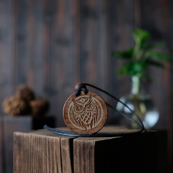 Tribal Style Owl Necklace/Pendant. Made from solid sycamore wood. Round shape. Brown color. Adjustable cotton cord. Text customization.