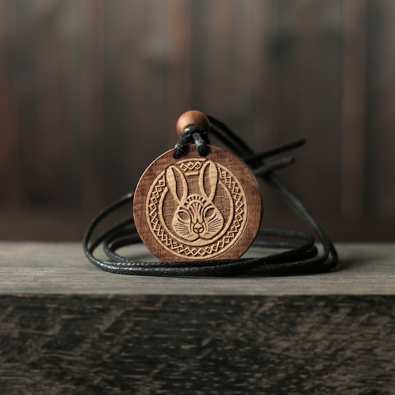 Celtic Style Rabbit Necklace/Pendant. Made from solid sycamore wood. Round shape. Brown color. Adjustable cotton cord. Personalization.
