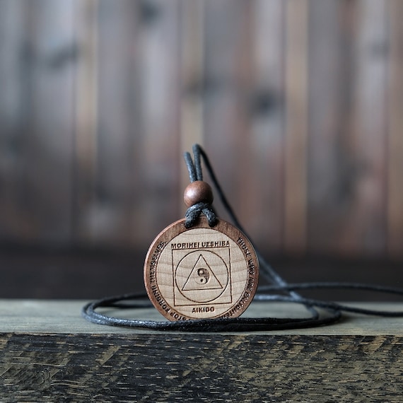 Wood Necklace-Aikido Pendant, Martial Art Necklace, Made from solid sycamore wood. Round shape. Brown color. Adjustable cotton cord.