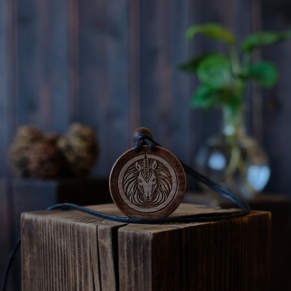 Unicorn Wooden Necklace/Pendant. Made from solid sycamore wood. Round shape. Brown color. Adjustable cotton cord.