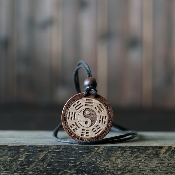 Taekwondo Necklace/Pendant, Martial Art Necklace. Made from solid sycamore wood. Round shape. Brown color. Adjustable cotton cord.