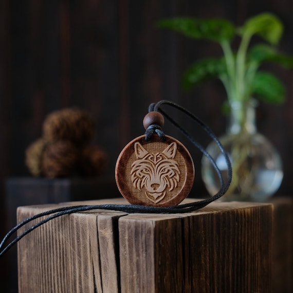 Wooden Necklace. Celtic Style Wolf Wooden Necklace/Pendant. Made from solid sycamore wood. Round shape. Brown color. Adjustable cotton cord.