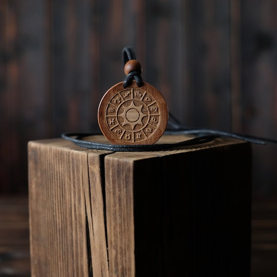 Sun Symbol Necklace/Pendant. Made from solid sycamore wood. Round shape. Brown color. Adjustable cotton cord. Text customization.