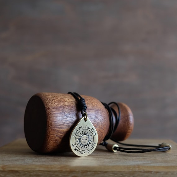 I Am the Creator of My Own Reality” Brass Pendant | Sun Symbol Necklace | Law of Attraction Jewelry | Leather Cord | Empowerment Gift