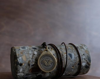 Wolf's Celtic Style Necklace/Pendant. Made from Solid Brass with an Adjustable/Sliding Leather Cord.