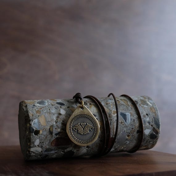 Wolf's Celtic Style Necklace/Pendant. Made from Solid Brass with an Adjustable/Sliding Leather Cord.