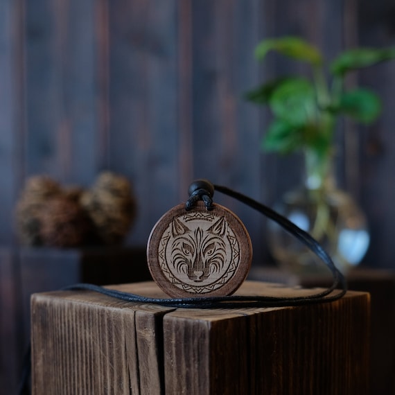 Wolf Wooden Necklace/Pendant. Made from solid sycamore wood. Round shape. Brown colour. Adjustable cotton cord.