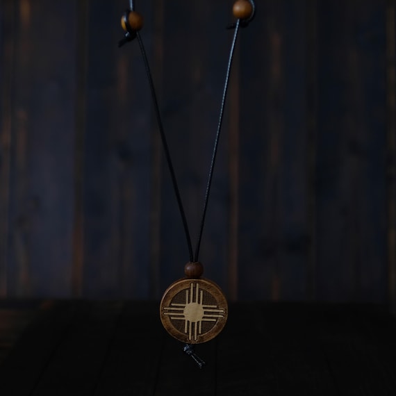 Wooden Necklace-Zia Symbol Pendant. Made From  Solid Sycamore Wood Pendant Talisman. Round shape. Brown colour.