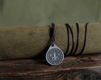 Titanium Wolf Pendant — Be the Hero, Leather Cord, Brass Beads