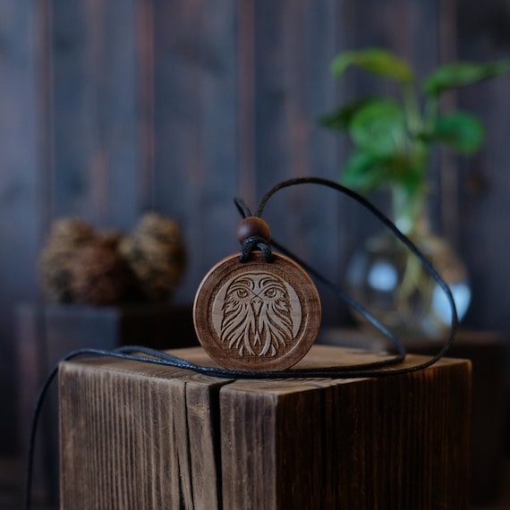 Kestrel Necklace/Pendant. Made from solid sycamore wood. Round shape. Brown color. Adjustable cotton cord. Text customization.