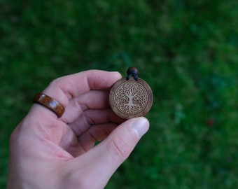 Tree of Life Wooden Necklace/Pendant. Made from solid sycamore wood. Round shape. Brown color. Adjustable cotton cord. Text customization.
