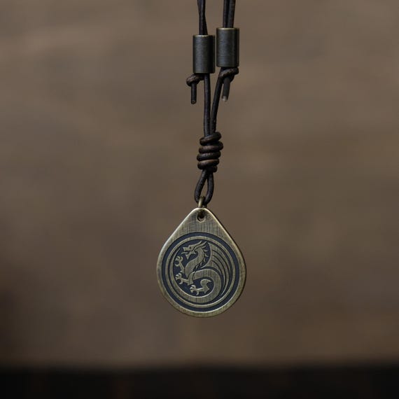 Nordic Dragon Necklace/Pendant. Made from Solid Brass with Adjustable/Sliding Leather Cord.