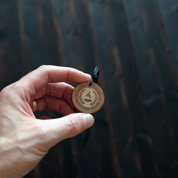 Demeter Goddess Symbol Necklace/Pendant. Made from solid sycamore wood. Round shape. Brown color. Adjustable cotton cord. Text customization