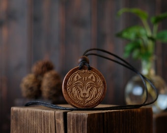 Wolf Wooden Necklace/Pendant. Made from solid sycamore wood. Round shape. Brown color. Adjustable cotton cord. Text customization.