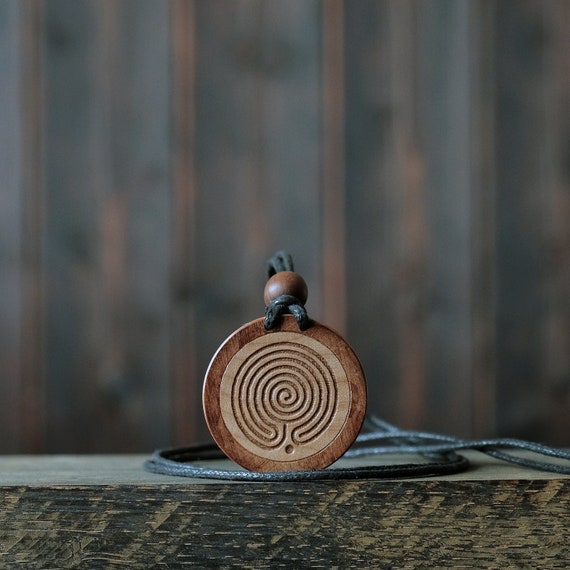 Labyrinth Necklace/Pendant. Made from solid sycamore wood. Round shape. Brown color. Adjustable cotton cord.