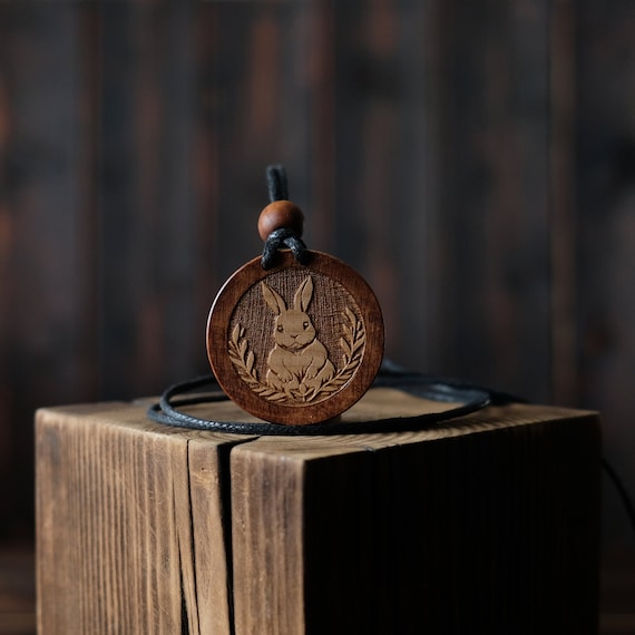 Rabbit Totem Necklace/Pendant. Made from solid sycamore wood. Round shape. Brown color. Adjustable cotton cord. Personalization.