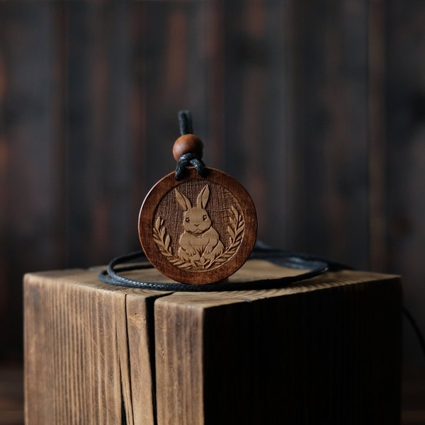 Rabbit Totem Necklace/Pendant. Made from solid sycamore wood. Round shape. Brown color. Adjustable cotton cord. Personalization.