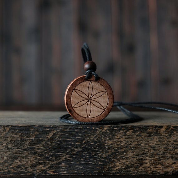 Germ Of Life Necklace/Pendant. Made from solid sycamore wood. Round shape. Brown color. Adjustable cotton cord. Text customization.