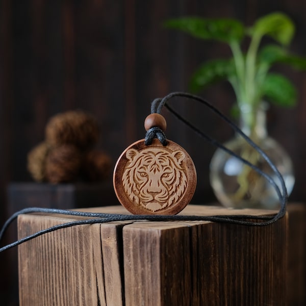 Tiger Wooden Necklace/Pendant. Made from solid sycamore wood. Round shape. Brown color. Adjustable cotton cord.