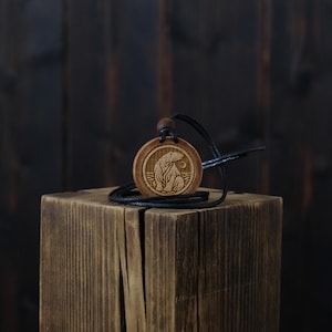 Polar Bear Wooden Necklace/Pendant. Made from solid sycamore wood. Round shape. Brown colour. Adjustable cotton cord.