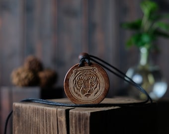 Tiger Head Necklace/Pendant. Made from solid sycamore wood. Round shape. Brown color. Adjustable cotton cord.