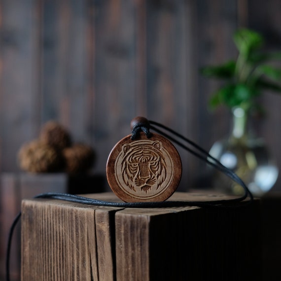 Tiger Head Necklace/Pendant. Made from solid sycamore wood. Round shape. Brown color. Adjustable cotton cord.