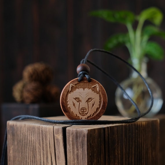 Wolf Wooden Necklace/Pendant. Made from solid sycamore wood. Round shape. Brown color. Adjustable cotton cord. Text customization.