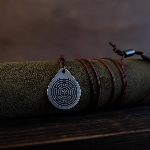 Hecate's Wheel Titanium Pendant — Strophalos, Leather Cord, Brass Beads