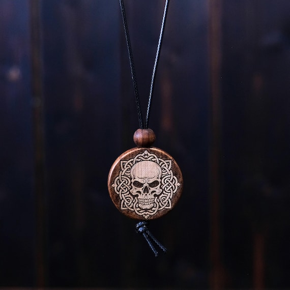Celtic Style Skull Necklace/Pendant. Made from solid sycamore wood. Round shape. Brown colour. Adjustable nylon cord. Text customization.
