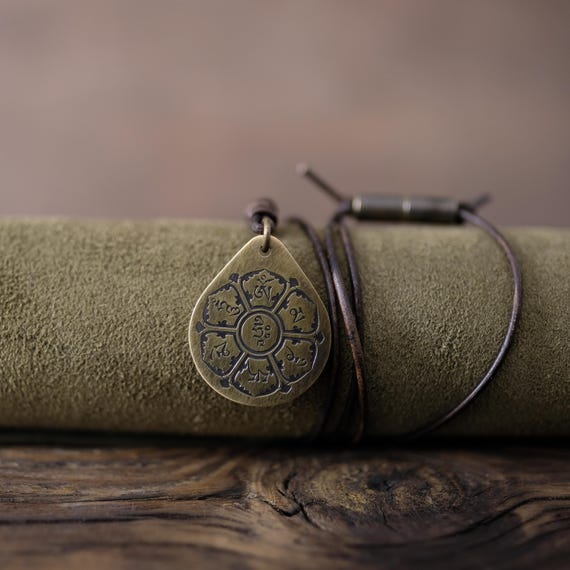 Om Mani Padme Hum Necklace/Pendant. Made from Solid Brass with Adjustable/Sliding Leather Cord.