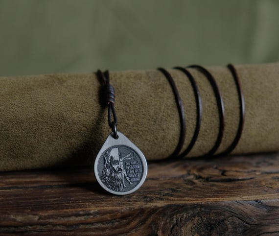 Vitruvian Man Titanium Pendant — Leonardo da Vinci, Leather Cord, Brass Beads