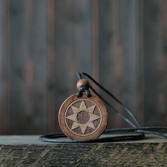 Star of Ishtar or Star of Inanna Necklace/Pendant. Made from solid sycamore wood. Round shape. Brown color. Adjustable cotton cord.