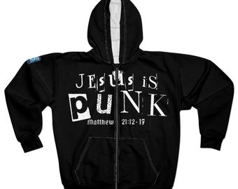 May include: Black zip-up hoodie with the text "JESUS is PUNK" in white, with "Matthew 21:12-17" below. The hoodie has a white interior lining in the hood and a full-length zipper.