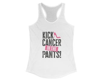 May include: White racerback tank top with the text "KICK CANCER IN THE PANTS!" in black and pink. A pink high heel is featured above the word "PANTS!". The tank top has a scoop neck and a racerback design.