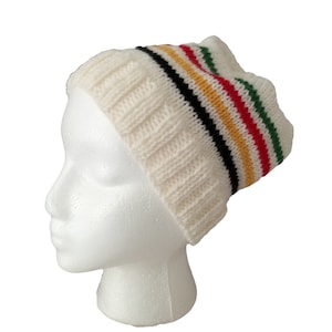 All wool, white beanie with HBC colored stripes, hand knit