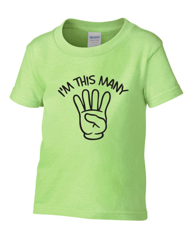 May include: A lime green short-sleeved t-shirt with black text that reads "I'm this many" and a black cartoon hand with four fingers raised.