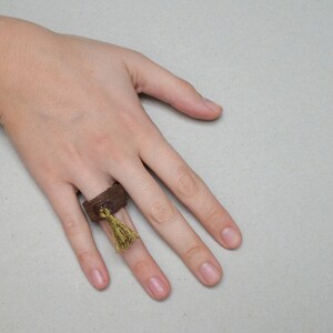 vine ring with gold tassel
