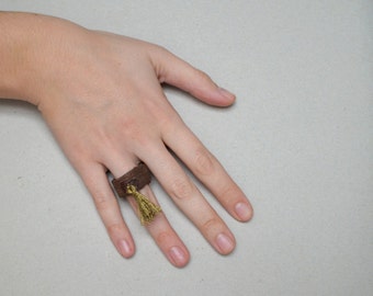 vine ring with gold tassel