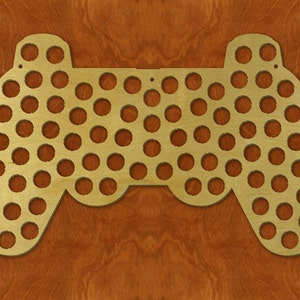 May include: A wooden game controller shaped bottle opener with 60 round holes for holding bottle caps. The bottle opener is made of light brown wood and has a natural finish.