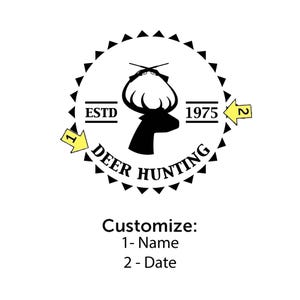 May include: A circular black and white graphic design featuring a deer silhouette with antlers and crossed rifles above. The text reads ESTD 1975 and DEER HUNTING. Two yellow arrows point to the design, labeled 1 for Name and 2 for Date customization.