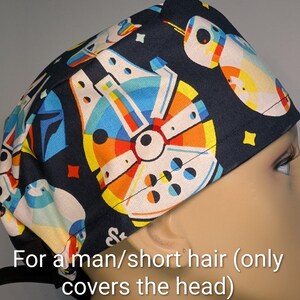 May include: A set of three ceramic mugs with a speckled, matte finish. Each mug features a different color: light blue, cream, and gray. The mugs have a simple, modern design and a comfortable handle.