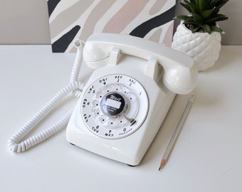 Retro rotary phone in white, restored and working