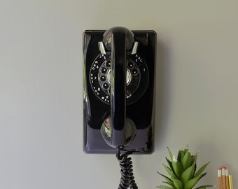 Black rotary dial wall phone restored and working