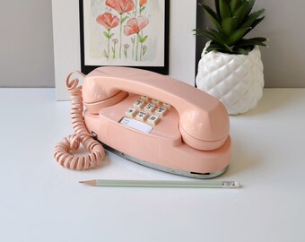 Princess phone in peach, restored and working touch tone retro Princess phone