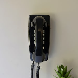 Retro touch tone trimline wall phone in black restored and working