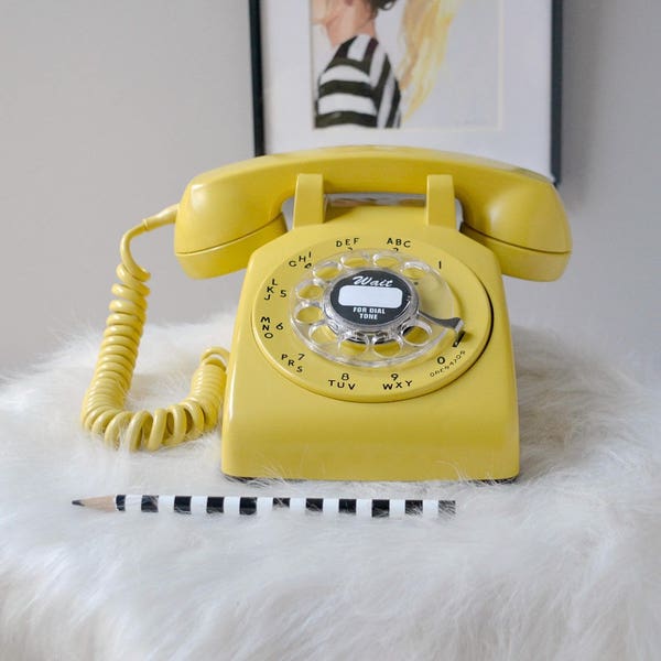 Vintage rotary phone; working rotary dial telephone; retro phone in yellow; 1960's rotary dial desk phone; yellow telephone