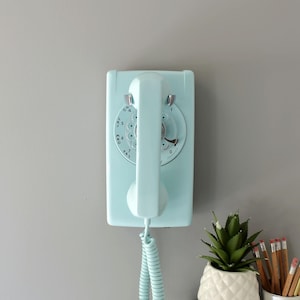 Turquoise rotary dial wall phone restored and working