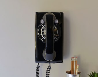 Rotary wall phone restored and working, black wall mount retro telephone
